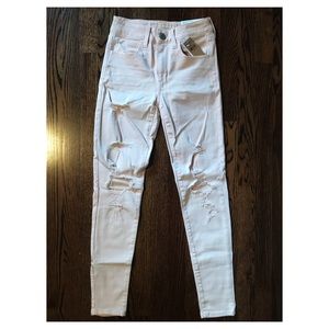 NEW WITH TAGS - pale pink distressed AE jeans